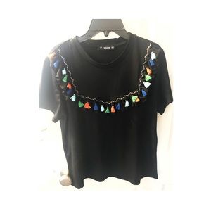 Tassel embellished ruffle T-shirt